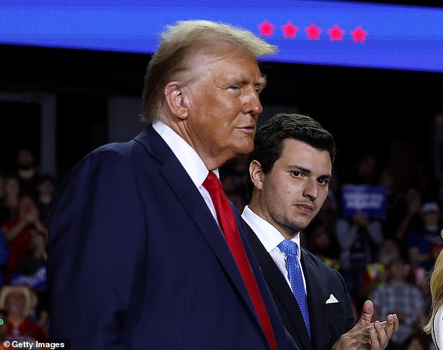 Trump, pictured in Grand Rapids, Michigan, held four rallies on Monday, the eve of Election Day. His rally in Michigan began at 10:30 p.m.