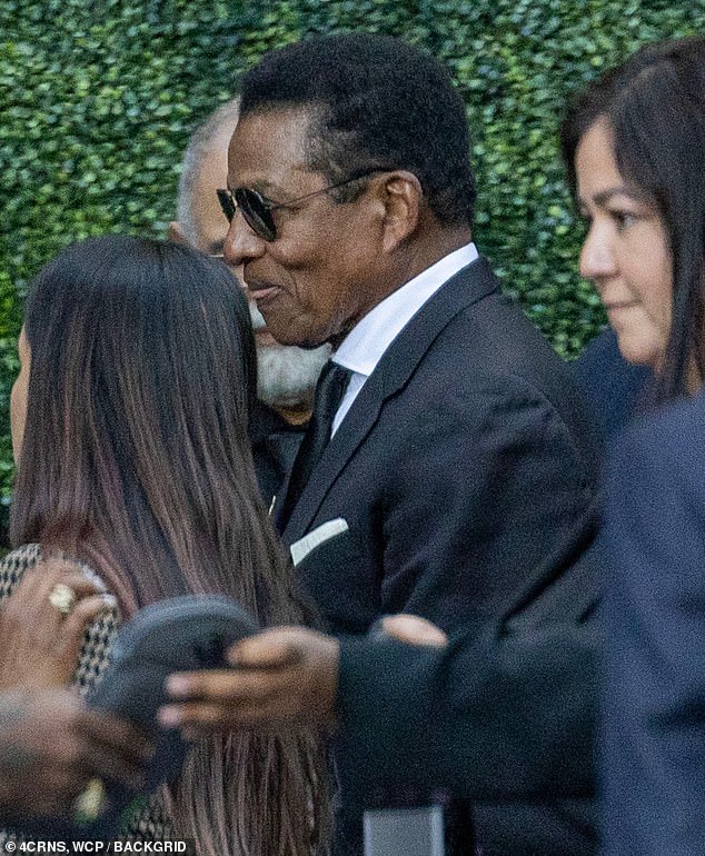 Jermaine Jackson paid his respects to his late brother at the memorial on Tuesday and was seen outside the Encino family home, also wearing a classic black suit and tie.