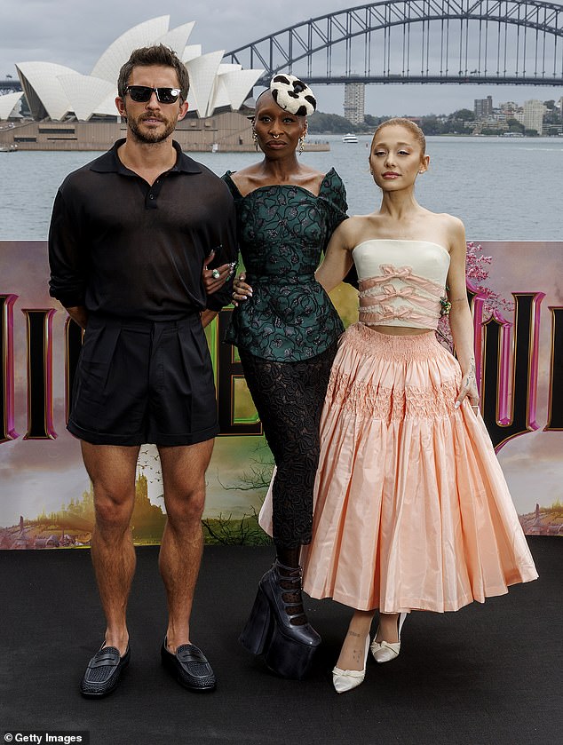 The actor's legs have set the Internet alight after he was photographed alongside Cynthia Erivo and Ariana Grande for a photo shoot at the Australian premiere.