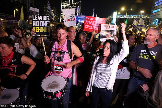 Hundreds of people took to the streets to demand the return of the hostages in a march through Tel Aviv on Tuesday night.