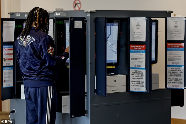 An Atlanta voter casts his ballot.