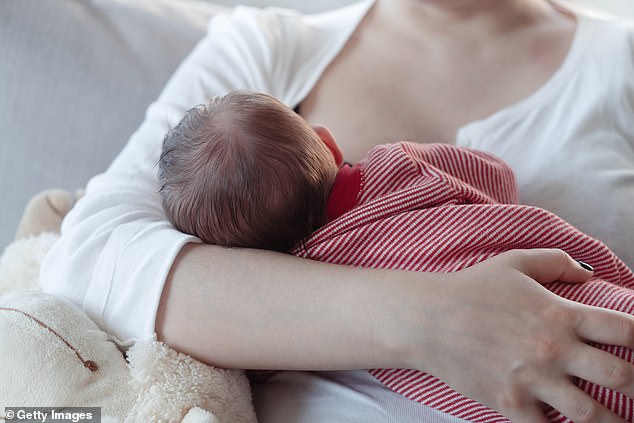 Stock photo of a young mother breastfeeding a baby. Breastfed children perform better on intelligence tests and are less likely to be overweight or obese later in life.