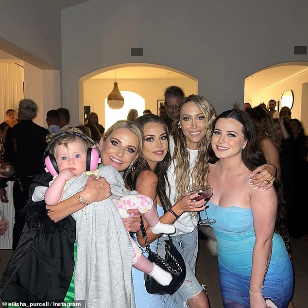 Photos shared on Eilisha's Instagram page show her (center) rubbing shoulders with Tish (center right), 57, as she was even part of the bridal party that day.