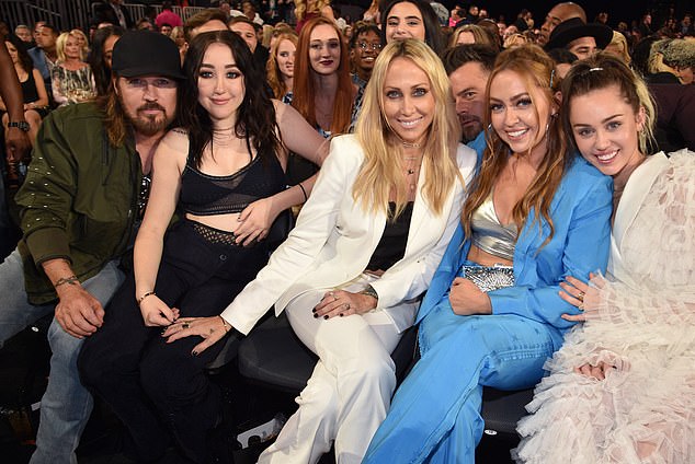 While some family members, like Tish's daughter Miley, were present, Tish's other children, Noah and Braison, were absent, fueling speculation of a breakup. Pictured: Tish and her ex Billy Ray with Noah, Miley and Brandi Cyrus.