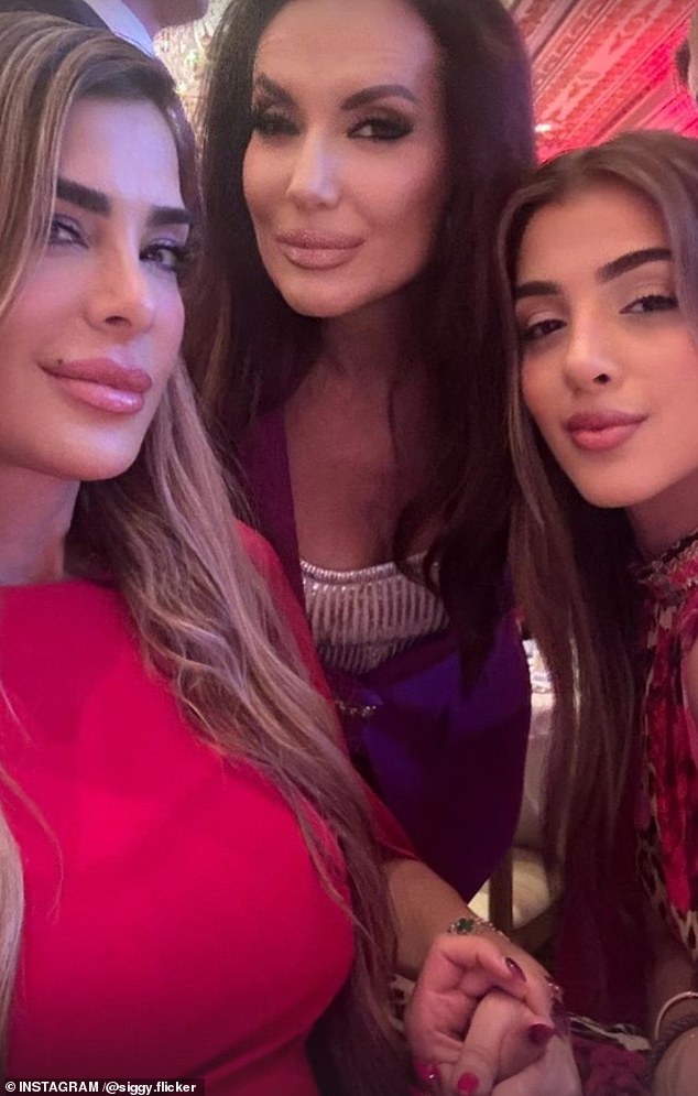 Trump supporter and Israeli television personality Siggy Flicker (left) shared a selfie with a confident smile shortly after the first swing state was called for Trump.