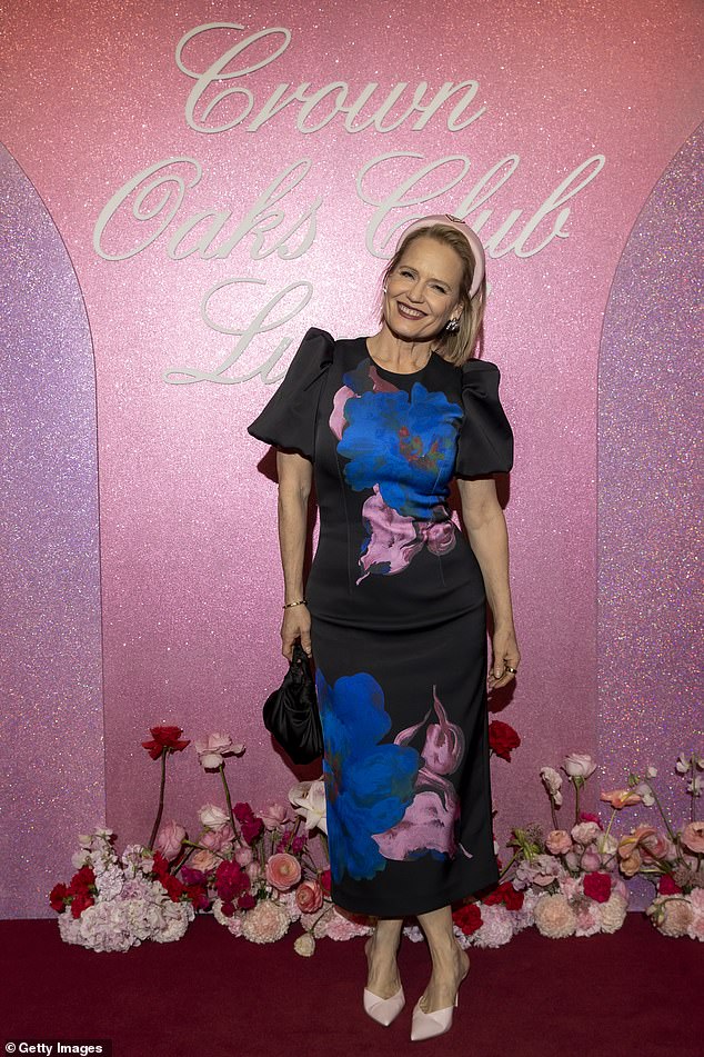 The Block's Shaynna Blaze made a bold statement in a black dress that featured large floral prints.