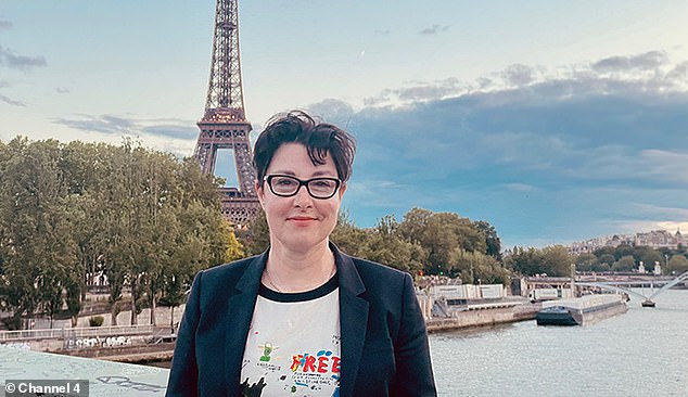 Sue outside the Eiffel Tower. She 