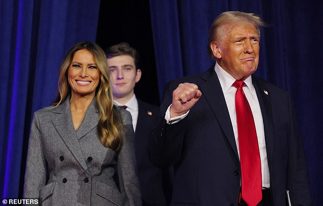 Melania wore a tailored gray suit while standing by her husband's side.