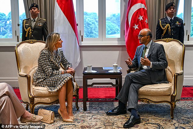 Máxima, 53, wore a stunning black and white checkered suit as she arrived at the Singapore FinTech Festival on Wednesday to deliver a speech in the Southeast Asian country.