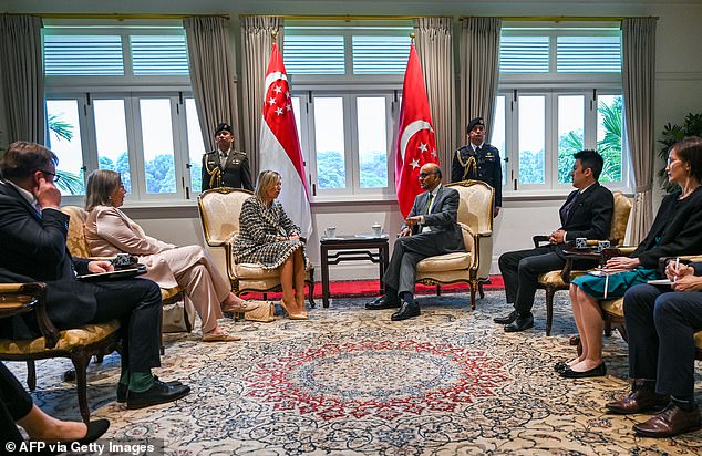 The two were photographed sitting together for a chat, while enjoying tea together.