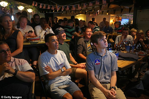 Trump supporters were also among the crowd glued to television screens at the Kent Street Hotel.