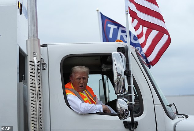 'What do you think of my garbage truck? This truck is in honor of Kamala and Joe Biden,' he told reporters in Green Bay.