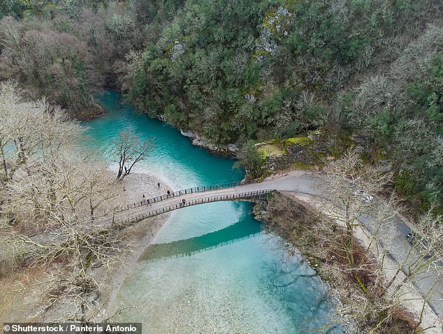 Above, the Aristi bridge and the waters 