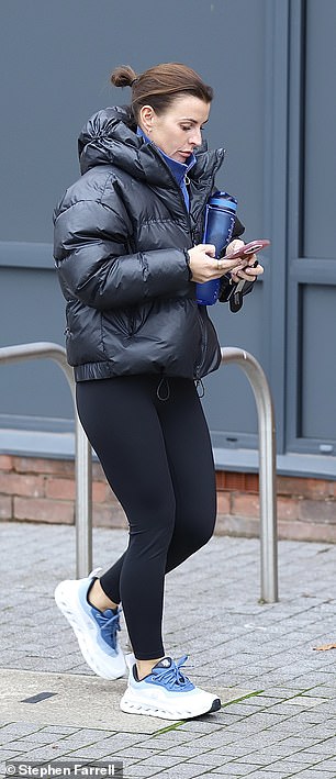 The television personality completed her outfit with matching sneakers and a matching water bottle.