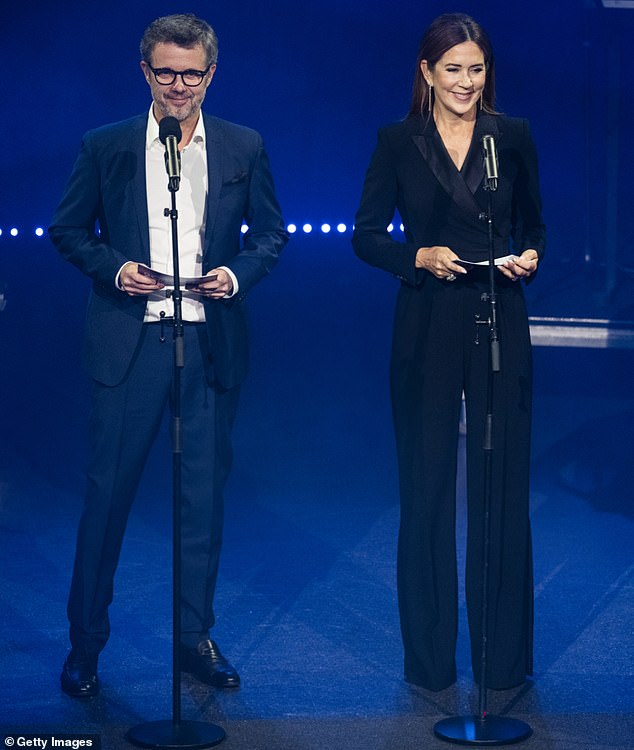 For the occasion, the royal mother of four, 52, opted for a sleek black silk lapel tuxedo jumpsuit from MaxMara.