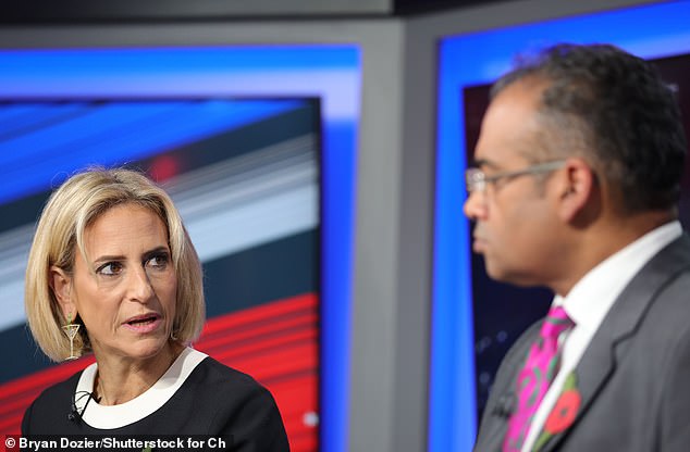 The former Newsnight presenter (left) was scolded by her co-presenter (right) earlier in the night after letting out a bad word.