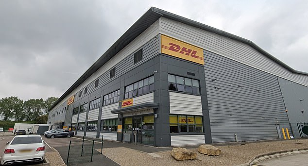 Counter-terrorism police are investigating whether Russia was behind an incendiary device which burst into flames at this DHL hub in Minworth, Birmingham (pictured)