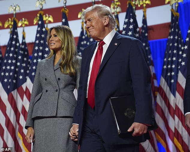 Donald Trump (pictured with his wife Melania) claimed victory and said that 