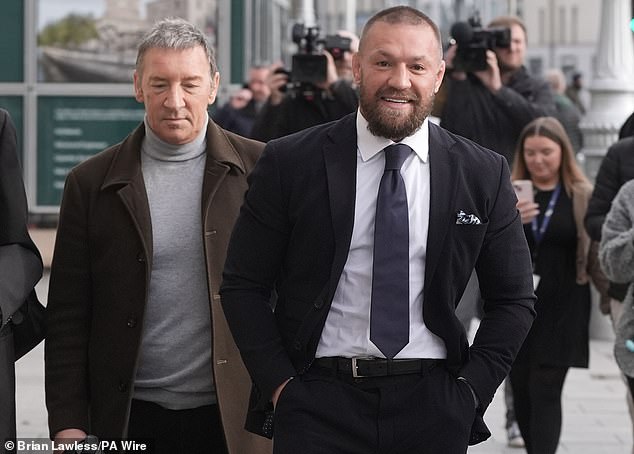 Mixed martial arts fighter Conor McGregor with his father Tony McGregor (left)