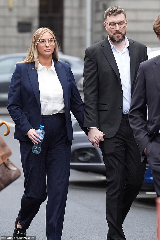 Nikita Ni Laimhin (left) outside the High Court in Dublin on Tuesday, where mixed martial arts fighter Conor McGregor appears in a personal injury case against him.