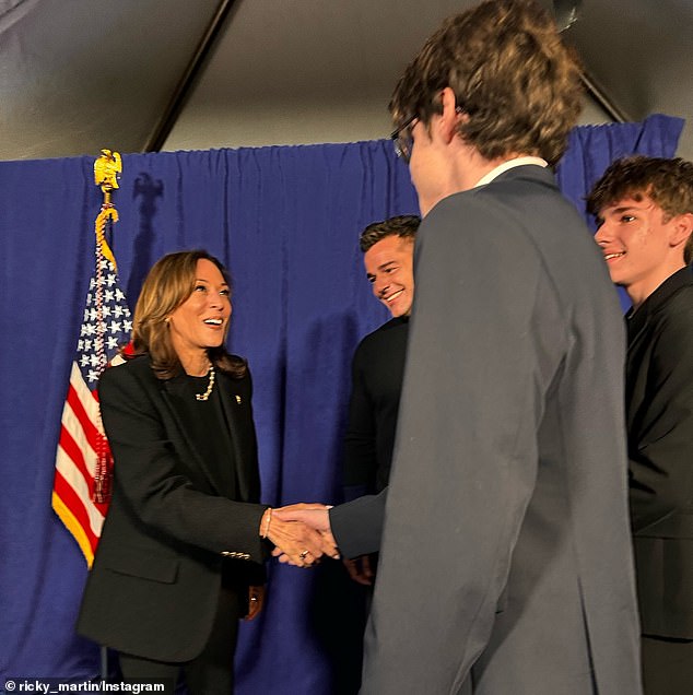 The singer published a photo of the vice president shaking hands with one of his 16-year-old children