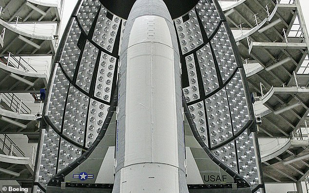 The X-37B spacecraft launched aboard a SpaceX Falcon Heavy rocket in December