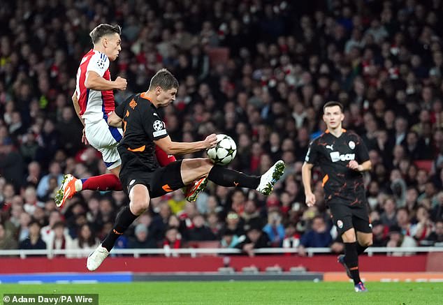 Arsenal were awarded a penalty against Shakhtar Donetsk after a cross hit a defender's hand.