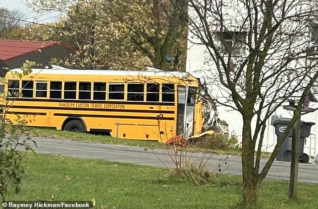 The bus was carrying 20 students and a driver when it crashed into the house.