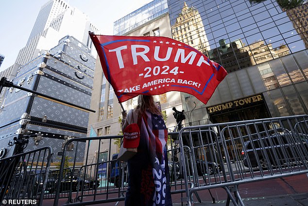 Trump supports waving flags in front of the president-elect's tower in New York