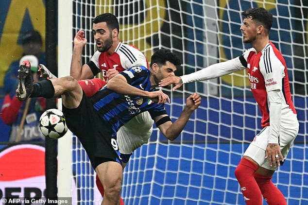 Arsenal's Mikel Merino was penalized for a handball on the stroke of half-time at San Siro