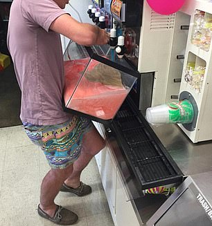 People took the opportunity to fill their own 'cup' on the popular day in 2016. This man used a fish tank