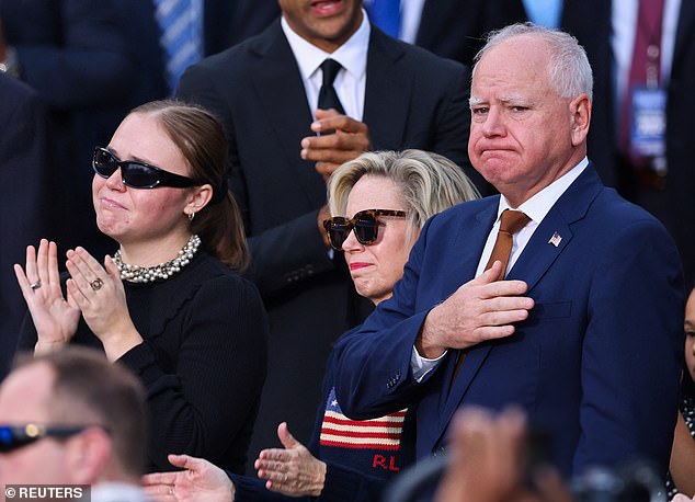 Harris' running mate Tim Walz and his wife Gwen are seen here Wednesday night as she conceded the election.