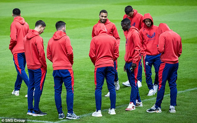 The Rangers squad familiarizes themselves with the playing field at the Georgios Karaiskakis Stadium