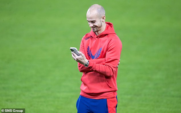 Rangers star Vaclav Cerny has fun with something on his phone before the big game