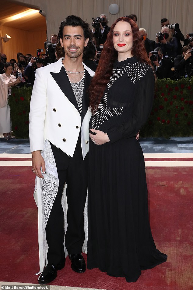 British star Sophie Turner, 28, realized she had to 'get the hell out' of America due to gun violence and the overturning of Roe v Wade (pictured with ex-husband Joe Jonas)