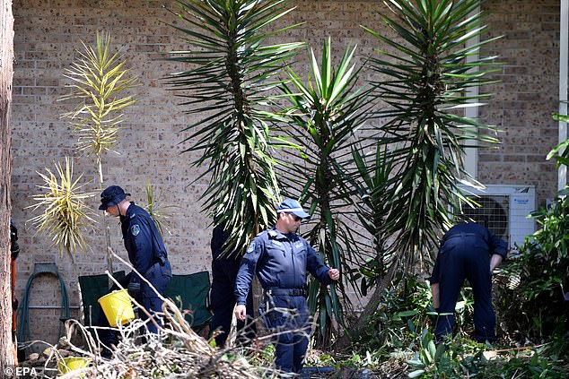 Police search Kendall's home in 2021, around the time the adoptive parents were being questioned at the New South Wales Crime Commission.