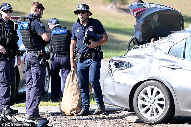 Two other patients were also injured following the horror accident and were treated at the scene for minor injuries (pictured, police at the scene of the accident).