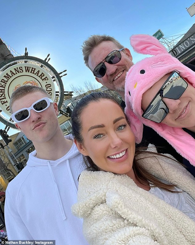 Ryan and Buckley are pictured with the former Collingwood star's children on a US holiday they took last year.