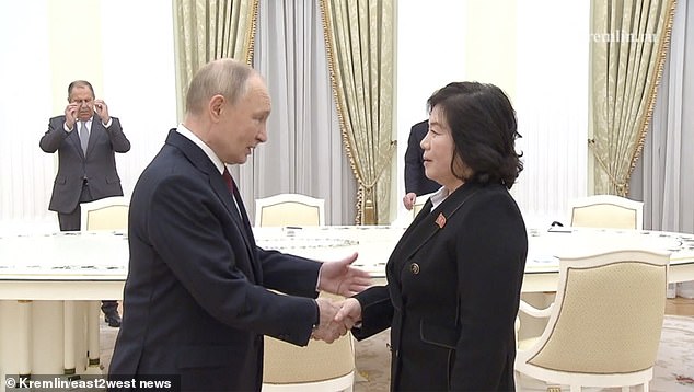 Vladimir Putin greets North Korean Foreign Minister Choe Son Hui in the Kremlin