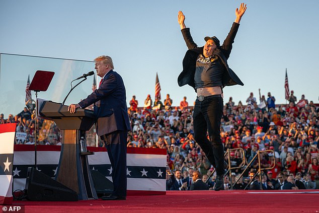 Anxiety: There are concerns that Musk (pictured on the campaign trail) will not spend enough time running Tesla due to distractions including his support for Trump.