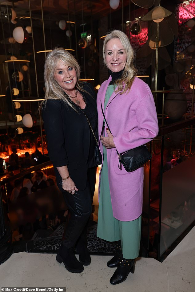 The actress, 54, posed at the party with A Place In The Sun presenter Lucy Alexander, 54.