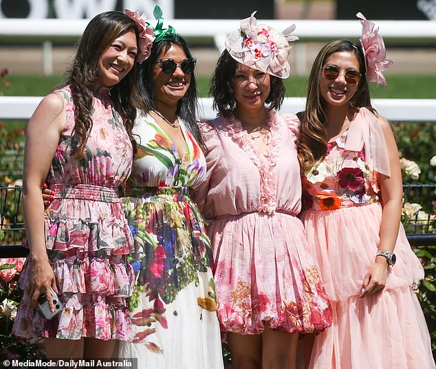 Many attendees paid tribute to the traditional Oaks Day color: pink!