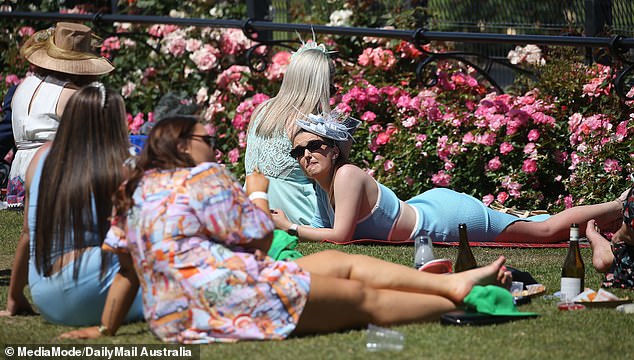 The long day was too much for some revelers and many opted to kick off their heels and soak up the sun.