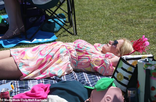 Sunbathing: Attendees enjoyed the morning sun while it lasted