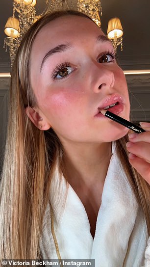 She looked into the camera as she showed off the product before carefully applying it and proudly displaying the results in her luxurious hotel room.