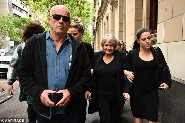 Joyleen Robinson arrives at the Victorian Supreme Court surrounded by her family in October last year.