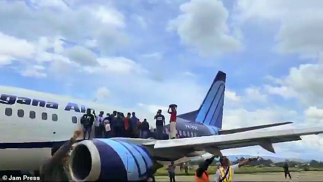 The Boeing 737-500 plane, bound for the city of Wamena, caught fire on Tuesday at Sentani Airport in Jayapura, Papua province, Indonesia.