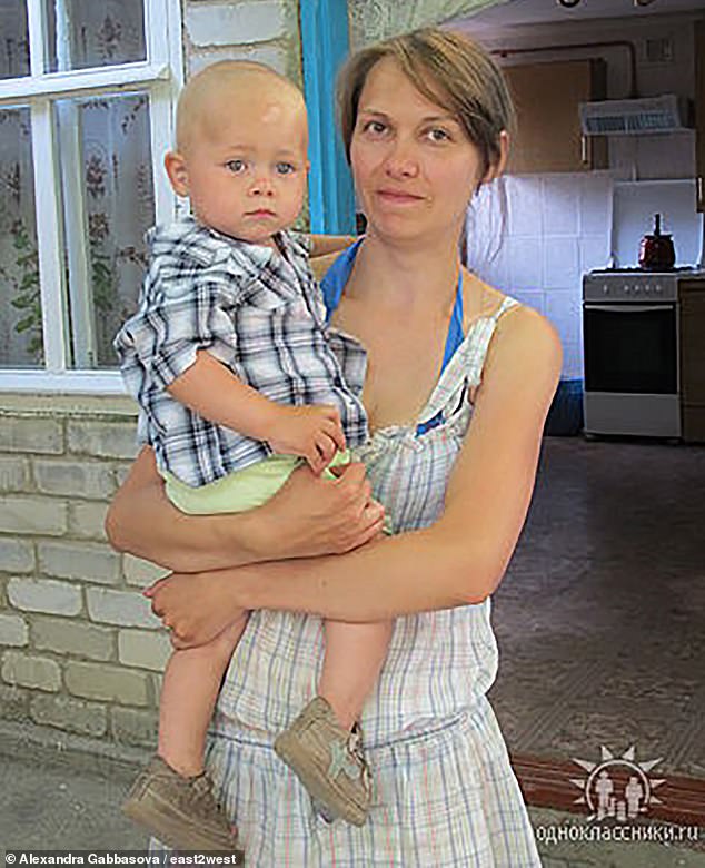 Alexandra Gabbasova, 48, photographed with her son when he was little