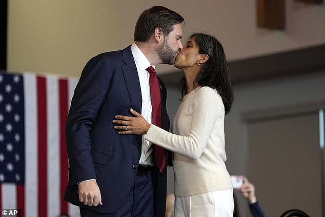 Usha and JD Vance kiss during the election campaign in Wisconsin