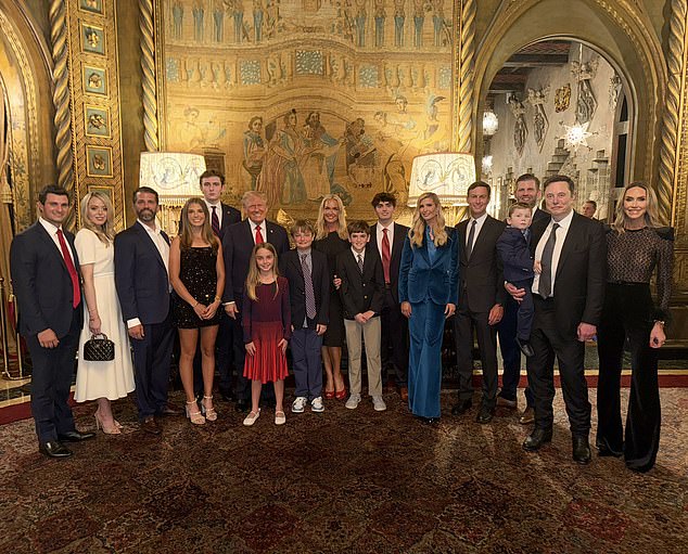 The Trump family poses with Elon Musk and his son after Donald's election victory